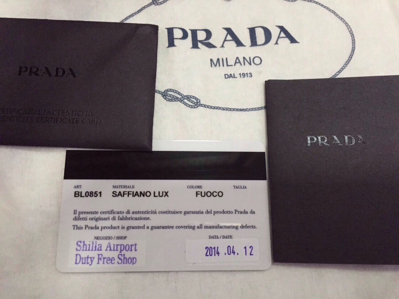 prada saffiano alma mini